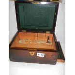 A Victorian rosewood jewelry box.