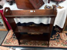 An Edwardian oak free standing book case COLLECT ONLY