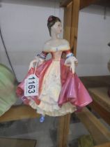 A Royal Doulton figurine - Southern Bell HN2229