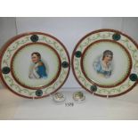 A pair of collector's plates and patch boxes featuring Napoleon Bonepart and Marie Louise.