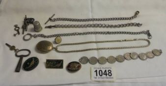 A quantity of watch chains, watch keys, badges etc.,