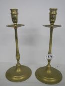 A good quality pair of solid brass candlesticks.