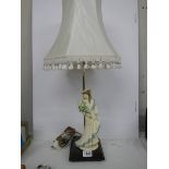 A modern figural table lamp.