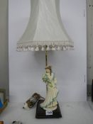 A modern figural table lamp.