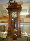 A Victorian mahogany twin weight Vienna wall clock, COLLECT ONLY.