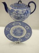 An early blue and white teapot with tea plate, marked H M & Co., England.