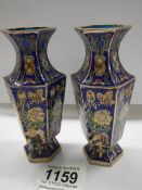 A small pair of Cloissonne' vases.