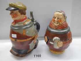 Two unusual German novelty lidded beer steins.