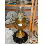 A Victorian oil lamp on pot base. COLLECT ONLY.