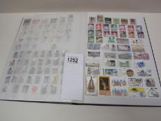 Lots of complete pages full of stamps from around the world, several spare pages to add to.