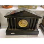A large black Palladian style mantel clock a/f