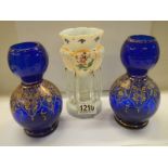 A mid 20th century opaque glass lustre and a pair of blue glass vases.