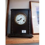 An oak cased Junghans mantle clock with enameled dial COLLECT ONLY