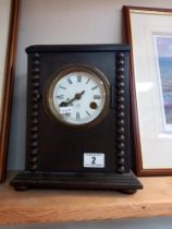 An oak cased Junghans mantle clock with enameled dial COLLECT ONLY