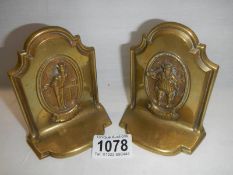 A pair of solid brass Dicken's character bookends, 11cm tall.