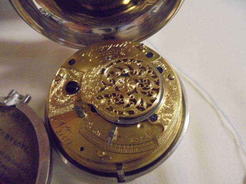 A silver pair-cased Verge, Springall, Norwich, No.21571 key wind pocket watch. cracked dial, not - Image 2 of 3