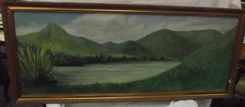 A gilt framed panoramic subtropical mountain scene oil on board 133cm x 57cm COLLECT ONLY