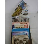 A mixed lot of old postcards.