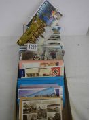 A mixed lot of old postcards.