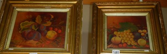 Two gilt framed still life paintings of fruit initialed A E B, 46.5 x 40 cm and 41 x 38 cm.
