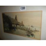 A framed and glazed coastal scene watercolour, signed. COLLECT ONLY.