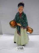 A Royal Doulton figurine - The Orange Lady HN1953