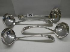 Four good silver plate soup ladles.