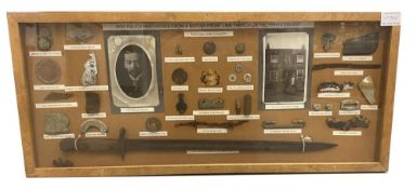 A framed WW1 display of Relics From a British Line Trench from Ypres Salient