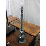 A bronzed finish white metal table lamp.