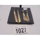 A pair of long drop and a pair of filigreee gold earrings, (no backs) 3.2 grams.