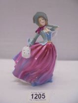 A Royal Doulton Pretty Ladies figurine, Autumn Breeze, HN1205.