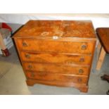 A four drawer figured mahogany chest (top needs re-polishing), COLLECT ONLY.