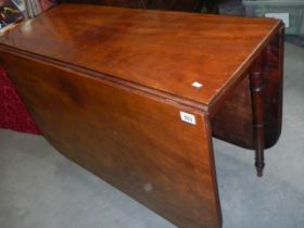 A good Victorian long drop leaf table in good condition, COLLECT ONLY.