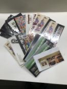 A collection of stamps including mint UK, presentation packs, Silver Jubilee packs & a 1997 Â£1 coin