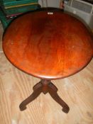 A Victorian mahogany oval tip top table, COLLECT ONLY.