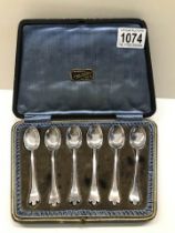 A cased set of six silver hall marked teaspoons.