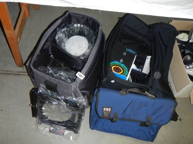 A large lot of camera/lighting accessories including books, bags etc., COLLECT ONLY.