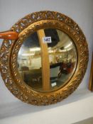 A gilt framed concave mirror, COLLECT ONLY.
