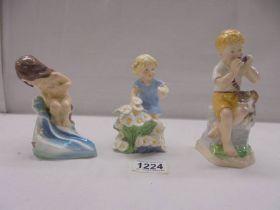 Three Royal Worcester Months of the Year figurines - May, June, July.