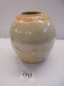 An early 18th century Chinese ginger jar with blue decoration (missing cover), 16cm tall.