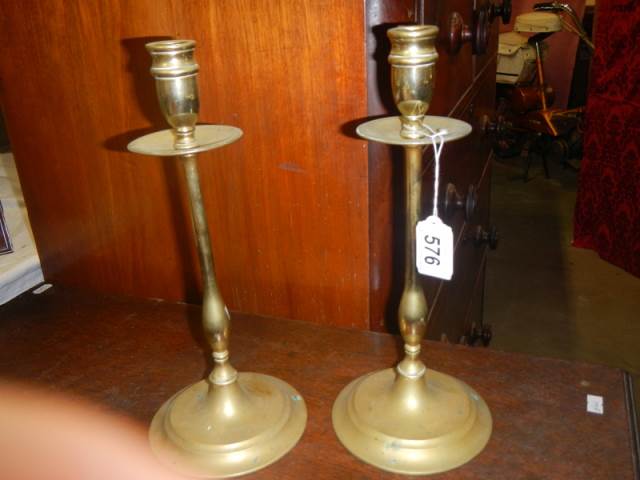 A good pair of Victorian brass candlesticks.