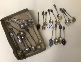 A quantity of collectable teaspoons including an enamel example