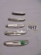 Five silver and mother of pearl fruit knives circa 1852, 1894, 1896, 1900 and 1923.