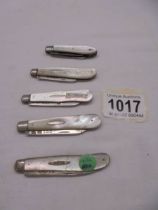 Five silver and mother of pearl fruit knives circa 1852, 1894, 1896, 1900 and 1923.