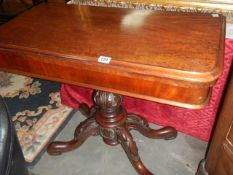 A Victorian mahogany centre pedestal fold over card table, COLLECT ONLY.