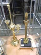 A Brass Corinthian column table lamp base and one other.