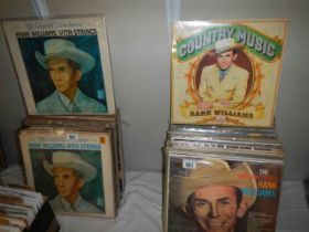 A good lot of Hank Williams LP records.