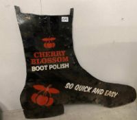A large Boot Shaped metal sign advertising Cherry Blossom Boot Polish