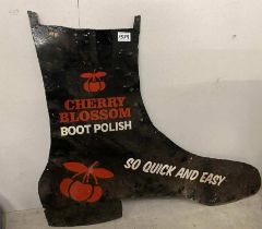 A large Boot Shaped metal sign advertising Cherry Blossom Boot Polish