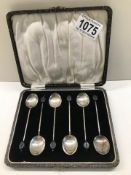 A cased set of six coffee bean spoons.